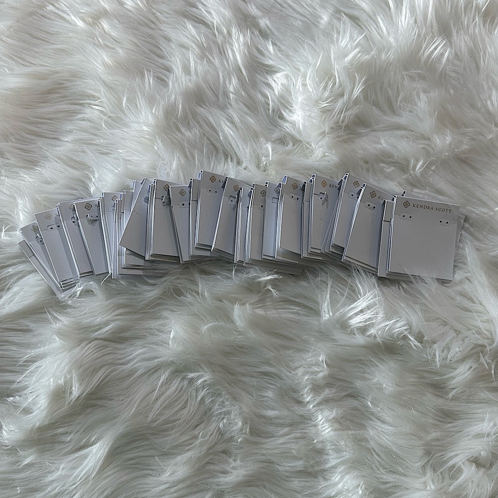 35 bundle of Kendra Scott white basic earring back and necklace packaging